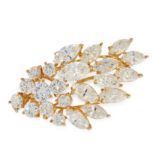 A DIAMOND BROOCH / PENDANT AND EARRINGS SUITE in yellow gold, each of foliate design, set with