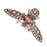 AN ANTIQUE RUBY AND DIAMOND INSECT BROOCH in yellow gold and silver, the body set with a principal