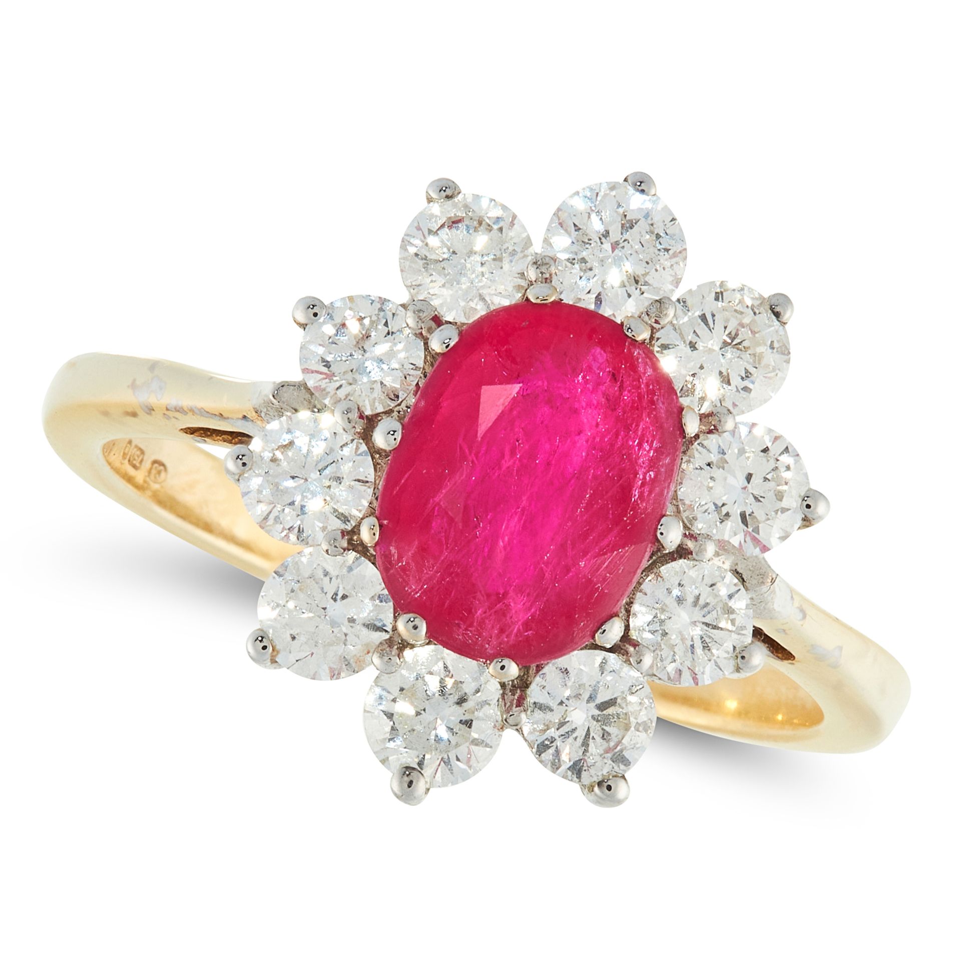 A RUBY AND DIAMOND CLUSTER RING in 18ct yellow gold, set with an oval cut ruby of 1.50 carats in a