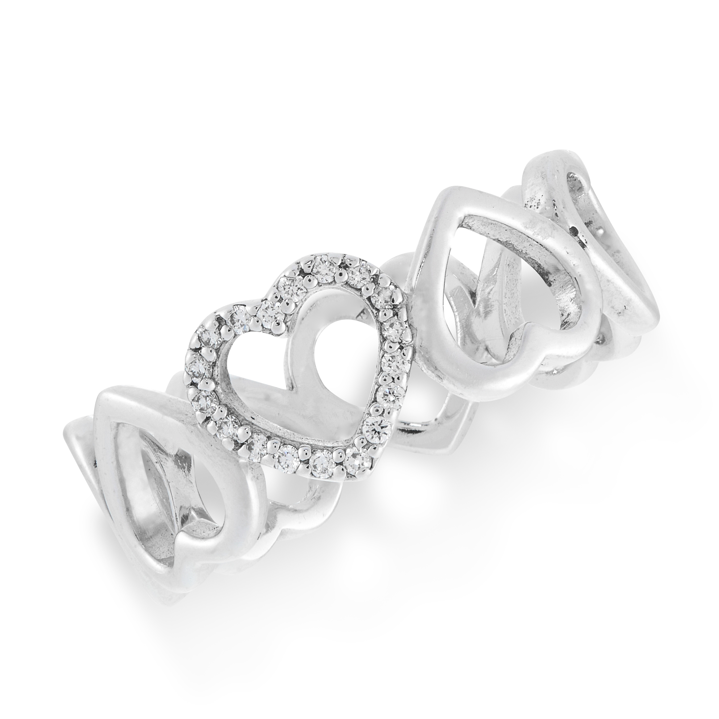 A DIAMOND HEART RING, TIFFANY & CO in 18ct white gold, the band formed of a row of eight hearts, one