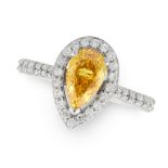 A FANCY INTENSE ORANGE-YELLOW DIAMOND AND WHITE DIAMOND RING in 18ct white gold, set with a pear
