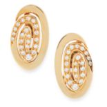 A PAIR OF DIAMOND CLIP EARRINGS, BULGARI in 18ct yellow gold, the oval bodies formed of scrolling