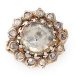 AN ANTIQUE DIAMOND CLUSTER RING in high carat yellow gold and silver, set with a central rose cut