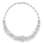 A VINTAGE DIAMOND BRACELET / NECKLACE CIRCA 1960 in 18ct white gold, set with a central round cut