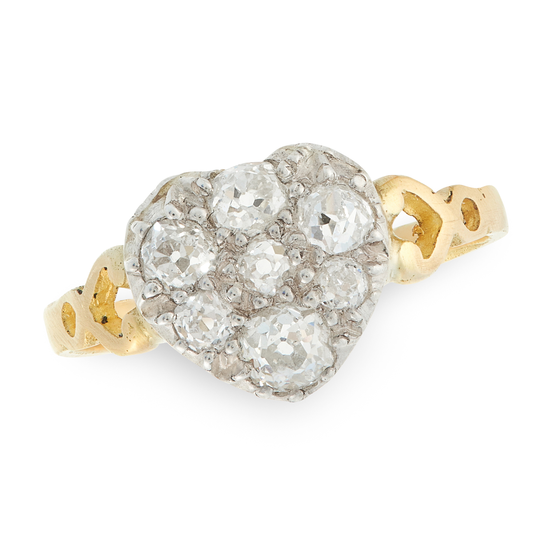 AN ANTIQUE DIAMOND DRESS RING in high carat yellow gold and silver, the face in the form of a heart,