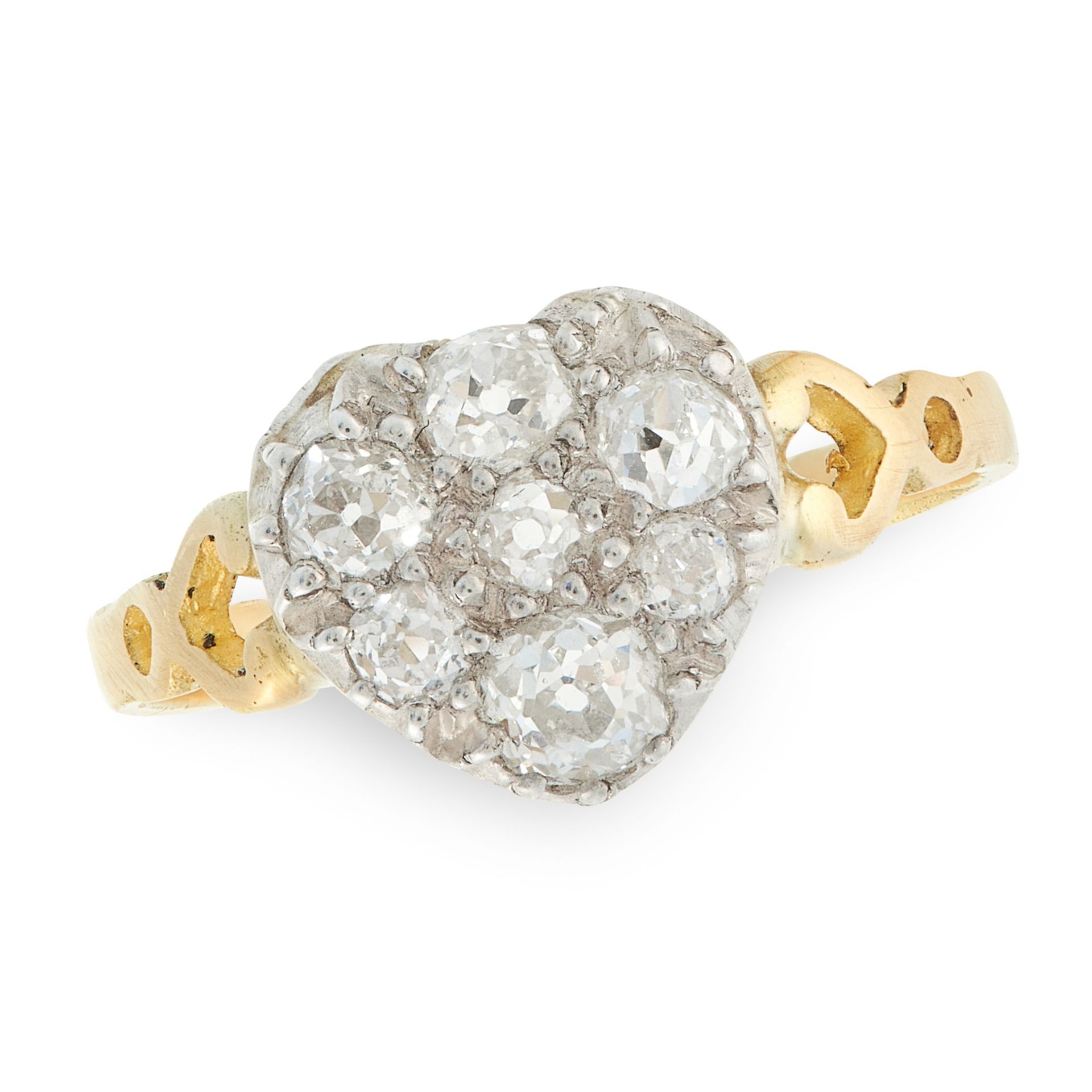 AN ANTIQUE DIAMOND DRESS RING in high carat yellow gold and silver, the face in the form of a heart,