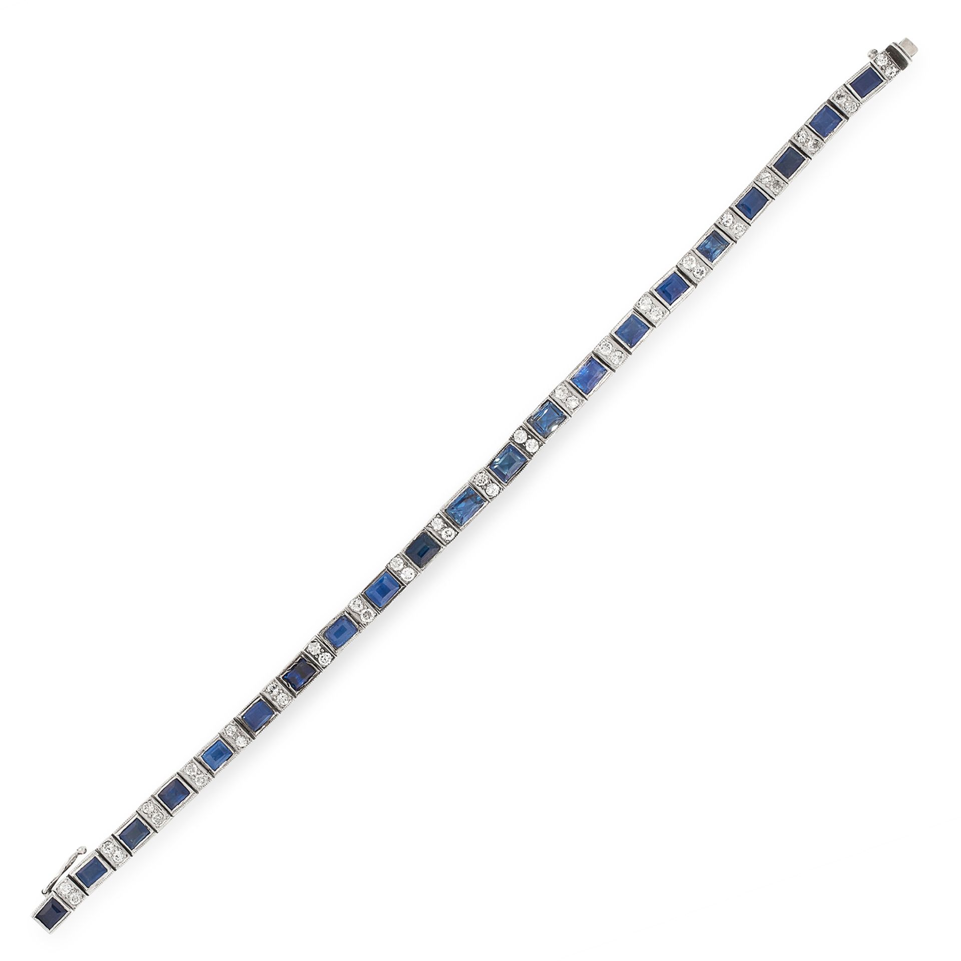 A SAPPHIRE AND DIAMOND LINE BRACELET comprising a row of twenty one graduated step cut blue - Image 2 of 2