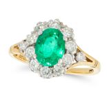 AN EMERALD AND DIAMOND CLUSTER RING in 18ct yellow gold, set with an oval cut emerald of 1.31 carats
