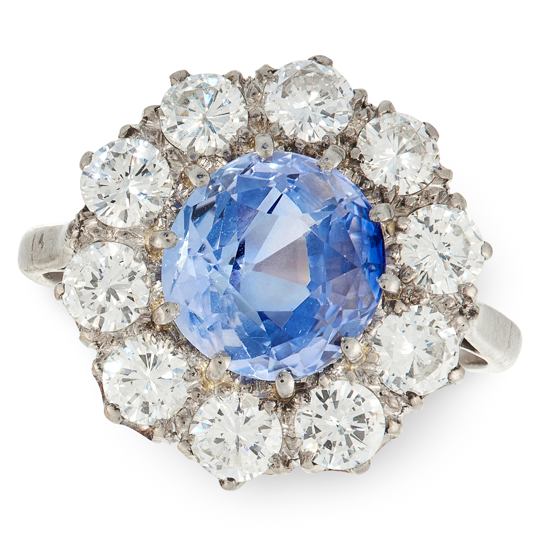 A CEYLON NO HEAT SAPPHIRE AND DIAMOND RING in 18ct white gold and platinum, set with a round cut