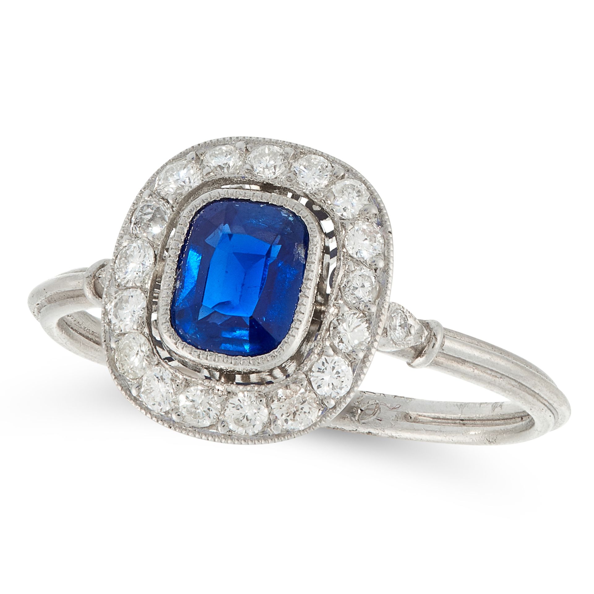 A SAPPHIRE AND DIAMOND DRESS RING in platinum, set with a cushion cut sapphire of 0.77 carats within - Image 2 of 2