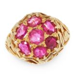 AN ANTIQUE RUBY DRESS RING, LATE 19TH CENTURY in yellow gold, set with a cluster of seven cushion