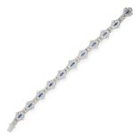 A SAPPHIRE AND DIAMOND BRACELET comprising a row of eleven navette motifs set with trios of