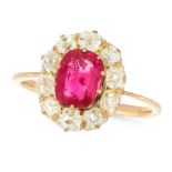 AN ANTIQUE BURMA NO HEAT RUBY AND DIAMOND RING in yellow gold, set with a cushion cut ruby of 1.31