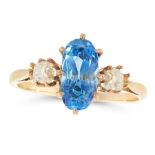 A CEYLON NO HEAT SAPPHIRE AND DIAMOND RING in high carat yellow gold, set with an oval cut