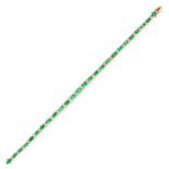 AN EMERALD AND DIAMOND BRACELET in 18ct yellow gold, comprising a single row of twenty six graduated