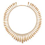AN ANTIQUE FRINGE NECKLACE, 19TH CENTURY in yellow gold, the snake link chain suspending a series of