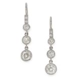 A PAIR OF DIAMOND DROP EARRINGS each set with a trio of graduated old cut diamonds suspended below