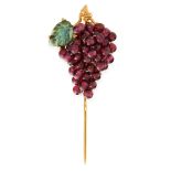 A GARNET AND EMERALD GRAPE TIE PIN in 18ct yellow gold, designed as a bunch of grapes, comprising of