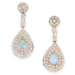 A PAIR OF OPAL AND DIAMOND EARRINGS each set with pear shaped opal cabochon within two halos of