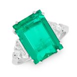 A COLOMBIAN EMERALD AND DIAMOND RING in platinum, set with a step cut emerald of 7.19 carats,