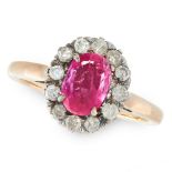 A BURMA NO HEAT PINK SAPPHIRE AND DIAMOND CLUSTER RING set with a pink sapphire of 0.9 carats in a