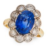 A CEYLON NO HEAT SAPPHIRE AND DIAMOND RING in 18ct yellow gold, set with an oval cut blue sapphire