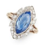 A CEYLON NO HEAT SAPPHIRE AND DIAMOND RING in white gold, set with a central marquise cut blue