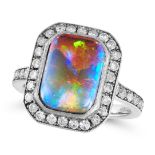 A BLACK OPAL AND DIAMOND RING in 18ct white gold, set with a rectangular cabochon black opal of 3.15