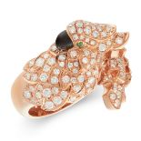 AN ONYX, DIAMOND & EMERALD RING in 18ct rose gold, in the manner of Cartier Les Oiseaux Liberes