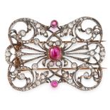 AN ANTIQUE DIAMOND AND RUBY BROOCH in yellow gold and silver, in open framework design, set with