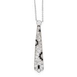 AN ONYX AND DIAMOND PENDANT NECKLACE in platinum, the tapering body with openwork designs set with