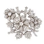 AN ANTIQUE DIAMOND EN TREMBLANT BROOCH, 19TH CENTURY in yellow gold and silver, designed as a wreath