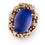 A VINTAGE LAPIS LAZULI AND DIAMOND RING in yellow gold, set with an oval lapis lazuli cabochon in