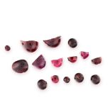 A MIXED LOT OF UNMOUNTED GARNET of various shapes including beads and cabochons, totalling 91.40