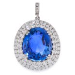 AN IMPORTANT CEYLON NO HEAT SAPPHIRE AND DIAMOND PENDANT in 18ct white gold, set with a tapering