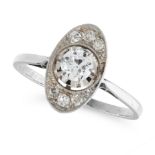 A DIAMOND DRESS RING in white gold or platinum, set with a round cut diamond of 0.30 carats in an