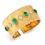 AN EMERALD AND DIAMOND CUFF BANGLE, BUCCELATTI in 18ct yellow and white gold, the textured gold body