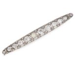 A DIAMOND BAR BROOCH in platinum, set with a row of round cut diamonds totalling 0.40 carats, in a