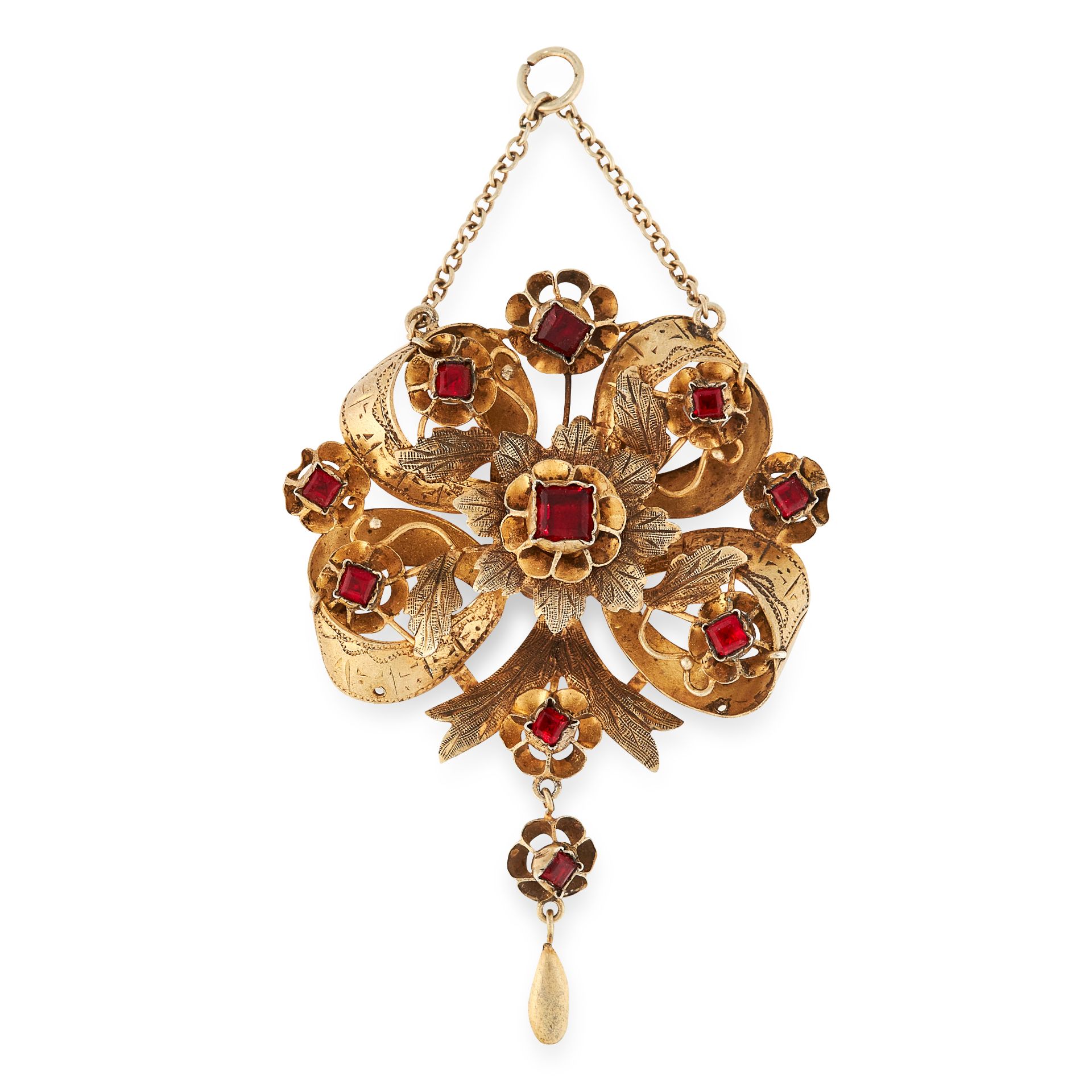 AN ANTIQUE RED PASTE PENDANT designed as a flower accented by foliage and scrolls, jewelled with