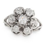 A DIAMOND CLUSTER RING in 18ct white gold, set with a cluster of old cut diamonds totalling 0.9-1.
