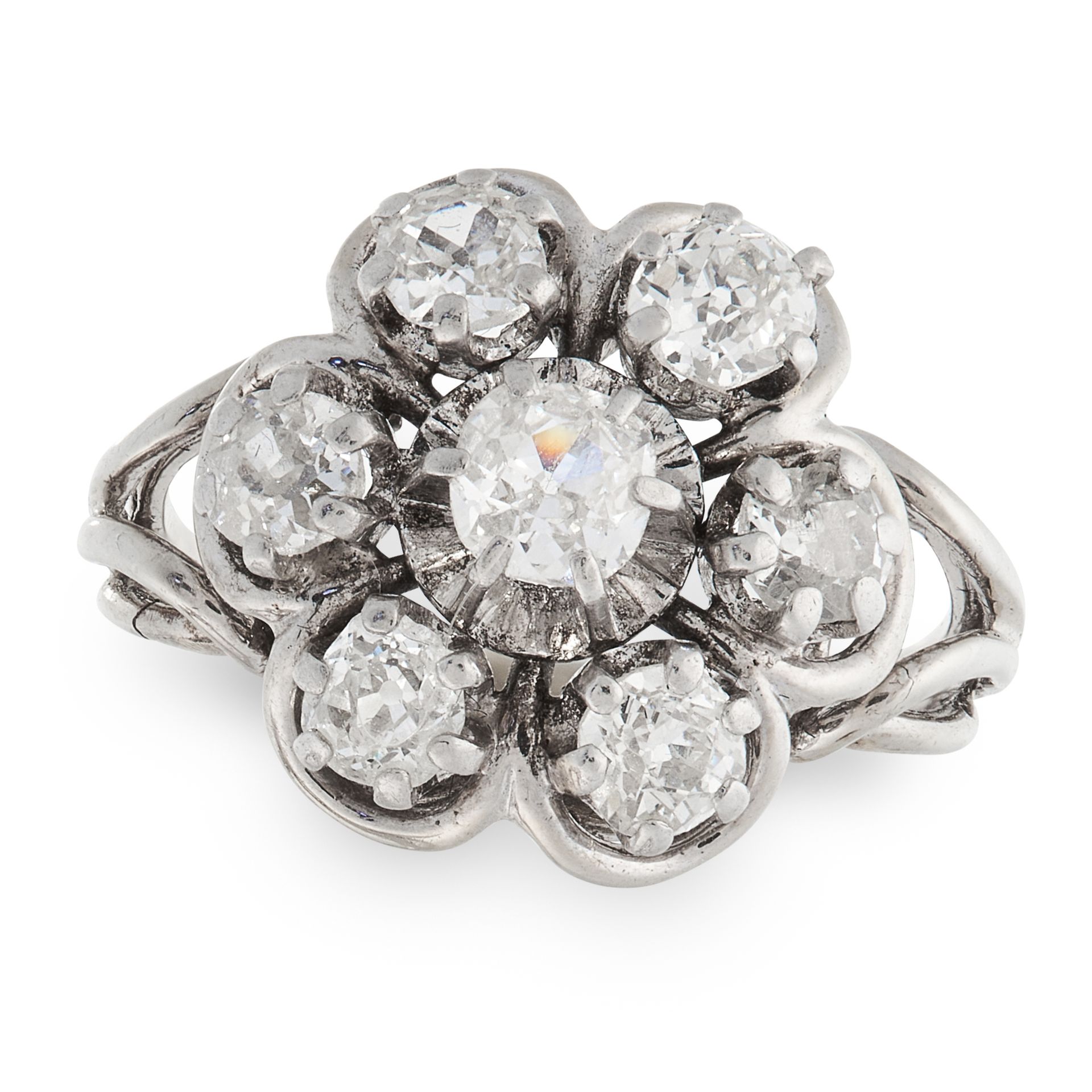 A DIAMOND CLUSTER RING in 18ct white gold, set with a cluster of old cut diamonds totalling 0.9-1.