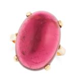 A PINK TOURMALINE DRESS RING in 18ct yellow gold, set with an oval cabochon pink tourmaline of 27.80
