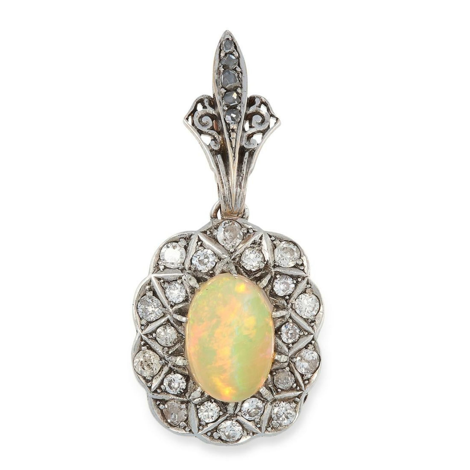 AN OPAL AND DIAMOND PENDANT in yellow and white gold, comprising of a large cabochon opal in a