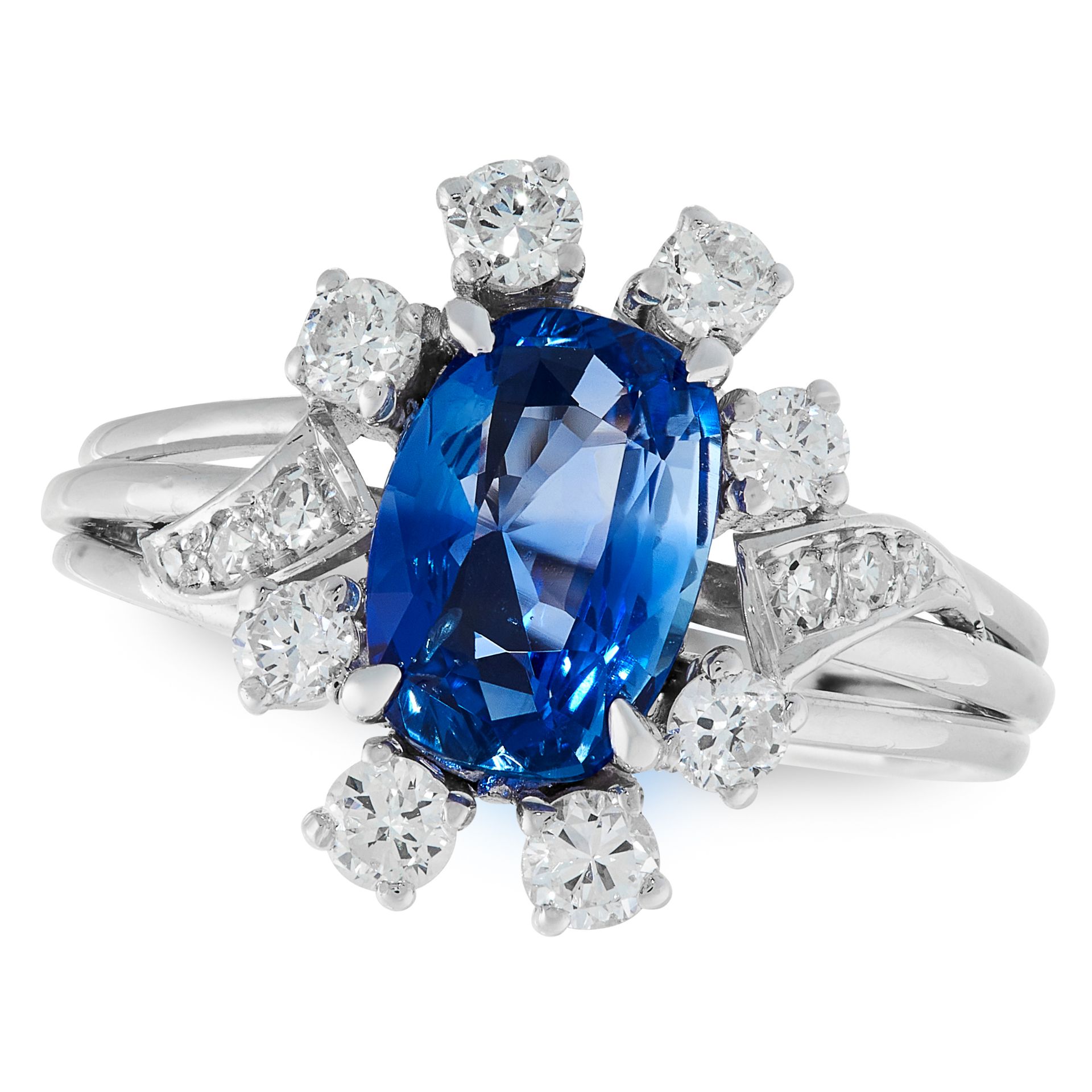 A CEYLON NO HEAT SAPPHIRE AND DIAMOND RING in 18ct white gold, set with a cushion cut sapphire of