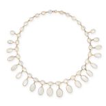 A ANTIQUE MOONSTONE FRINGE NECKLACE in yellow gold, comprising a row of thirty-one graduated oval