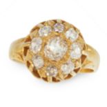 AN ANTIQUE DIAMOND DRESS RING in high carat yellow gold, set with a central old cut diamond within a