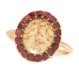 AN ANTIQUE GARNET MOURNING RING, EARLY 19TH CENTURY in yellow gold, the oval face set with a central