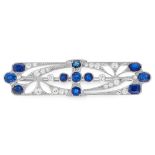 AN ANTIQUE SAPPHIRE AND DIAMOND BROOCH, CIRCA 1900 the elongated body of openwork design, set with