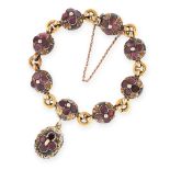 AN ANTIQUE GARNET MOURNING LOCKET BRACELET, 19TH CENTURY in yellow gold and silver, formed of