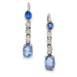 A PAIR OF SAPPHIRE AND DIAMOND EARRINGS each set with a cushion cut sapphire suspended below